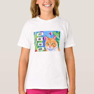 猫は私の部族 オレンジ色の猫と花 Tシャツ