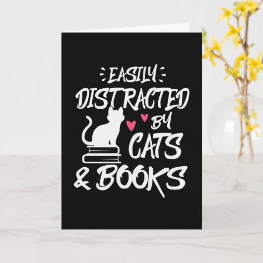 猫や本にすぐに気が散る カード (黄色い花)