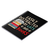 猫や本に心を奪われやすい |おもしろい猫 ノートブック (左側)