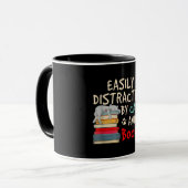 猫や本に心を奪われやすい |おもしろい猫 マグカップ (正面左)