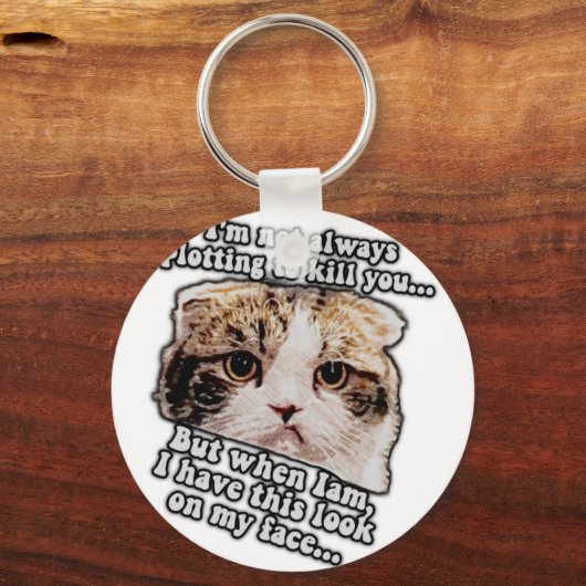 猫を飼っている人や子猫好きな人には不機嫌な猫ミーム キーホルダー (正面)