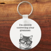 猫キーチェーンの文法を黙って修正してる キーホルダー (正面)