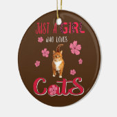 猫ヒョウの花が大好きおもしろいな少女 セラミックオーナメント (左)