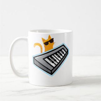 猫ピアノ かわいい子猫が音楽キーボードで遊ぶ コーヒーマグカップ
