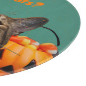 猫丸型のカッティングボードを持っている カッティングボード (角)