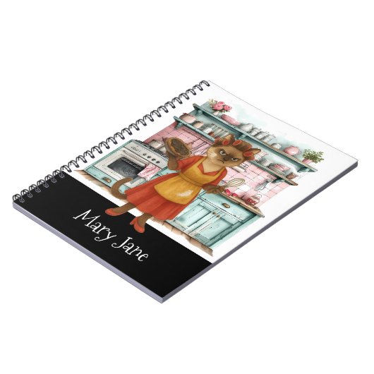 猫  専業主婦が台所で料理をしている ノートブック (左側)