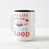 献血月は救命剤である献血 ツートーンマグカップ (正面左)