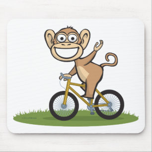 猿のバイクもしくは自転車に乗る人 マウスパッド
