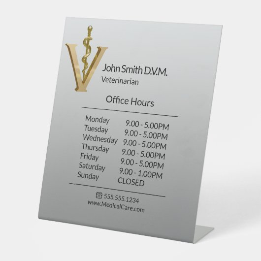 獣医学金ゴールドVアスクレピウス開館時間 台座サイン (正面)