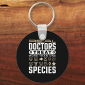 獣医実在が一つ以上の種を治療する キーホルダー (正面)