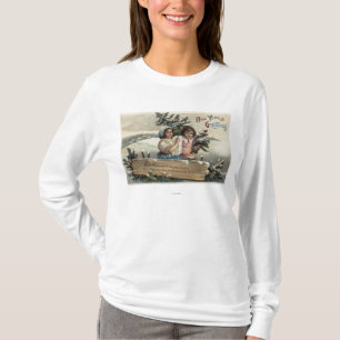 現在および木を握っている小さな女の子 Tシャツ