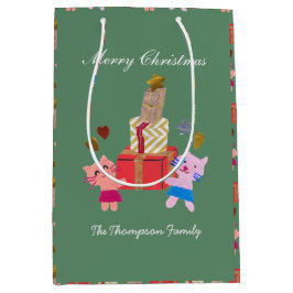 現在のコケの緑のクリスマスを持つかわいい猫 ミディアムペーパーバッグ