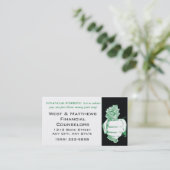 現金の金融取引カードを持つ手 名刺 (スタンド正面)