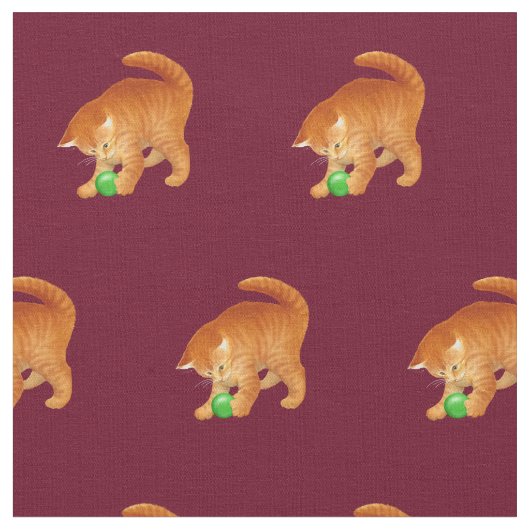 球の生地と遊んでいるオレンジ子猫猫 ファブリック (クローズアップ)