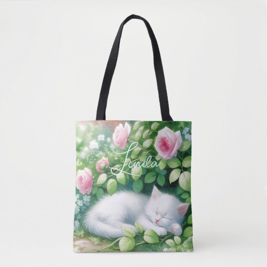甘い昼寝白い子猫をバラブッシュの下に トートバッグ (正面)