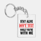 生きてろ。私と文字しない キーホルダー (正面左)