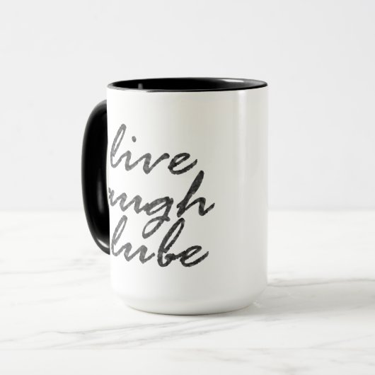 生きて笑うルベ マグカップ (正面左)