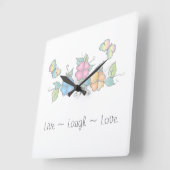 生き笑い |バタフライフローラ水色 スクエア壁時計 (傾斜)