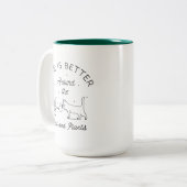 生は猫のまわりにと植物より ツートーンマグカップ (正面左)