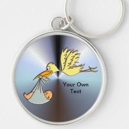 生まれたばかりのなベビーの到着-飛んでいるなこうのとり配達 キーホルダー