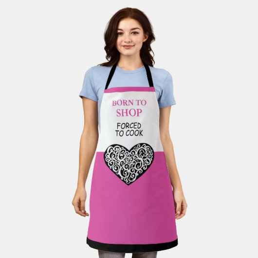 生まれ調理師おもしろいピンクエプロン エプロン (着用した状態)
