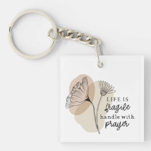 生命は壊れやすい取っ手と祈りの言葉花 キーホルダー
