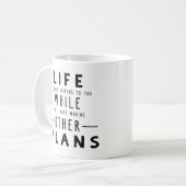 生命は…何が起こるかです コーヒーマグカップ (正面左)