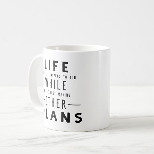 生命は…何が起こるかです コーヒーマグカップ (正面左)