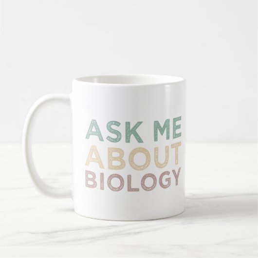 生物学頼学先生につおもしろいいて コーヒーマグカップ (左)