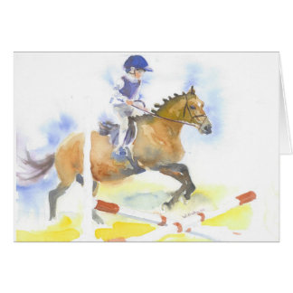 男の子は彼の子馬で跳んでいる