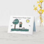 男の子サッカーのキャンプスティック考えるフィギュアの君 カード (黄色い花)