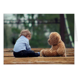 男の赤ちゃんおよびテディー・ベア