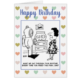 男はスキューバギアで魚に食べ物を与え服