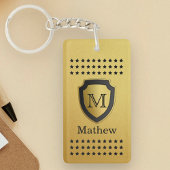 男らしい黒い金ゴールドの盾のモノグラムの名前の星パターン キーホルダー