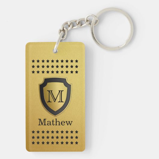 男らしい黒い金ゴールドの盾のモノグラムの名前の星パターン キーホルダー (裏面)