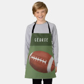 男子かわいいモダンサッカースポーツの子ども エプロン (着用した状態)