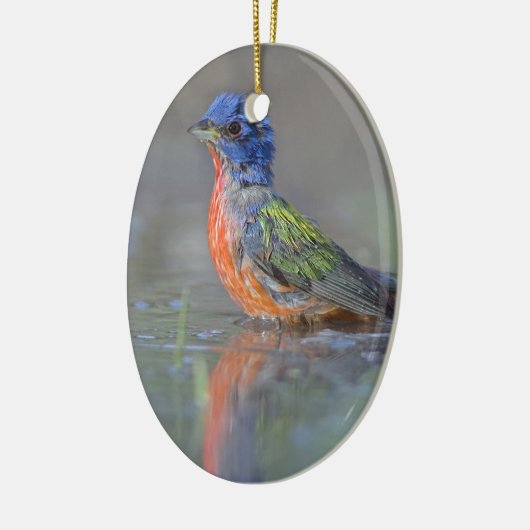 男性の色彩の鮮やかな旗布 セラミックオーナメント (左)