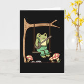 番上とスイングを持つ綿の実の美しい蛙 カード (黄色い花)