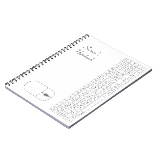 白いキーボードとマウスのノートブック ノートブック (左側)