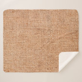 白いシートの上に置かれた茶色のパーラップ。抽象芸術バック シェルパブランケット (正面(横))