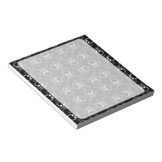 白いスカルとクロスボーンのグラフィックパターン ノートパッド (アングル)