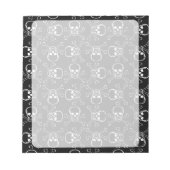 白いスカルとクロスボーンのグラフィックパターン ノートパッド (正面)