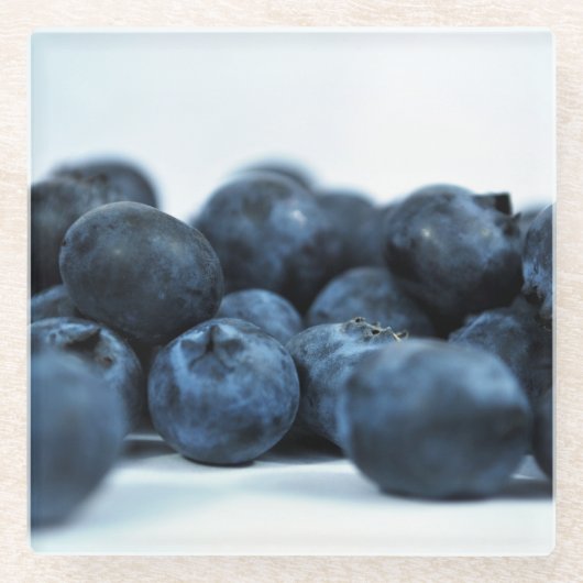 白いテーブルの青い果実 ガラスコースター (正面)