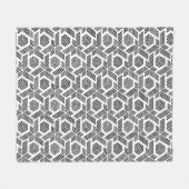 白いドットの幾何学的パターン上の黒 フリースブランケット (正面(横))