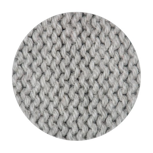 白いニットのウールのテクスチャ、クローズアップ写真。 カッティングボード (正面)