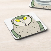 白いハンサムな緑のフクロウ コースター (左側)