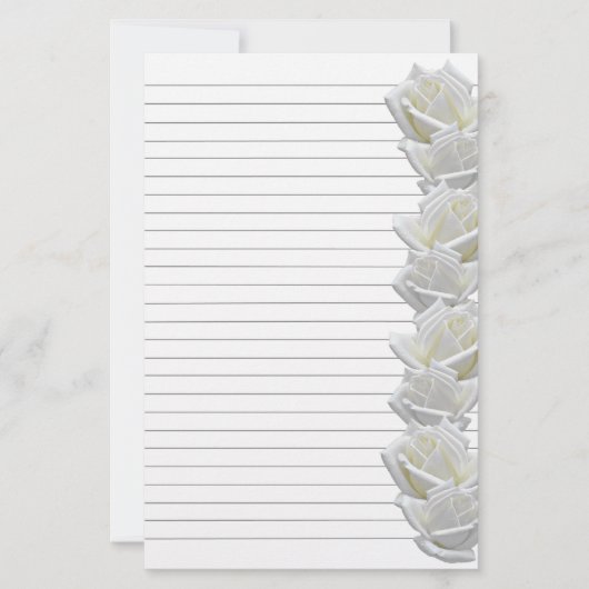 白いバラ縁どス2文房具が並ぶ 便箋 (正面)