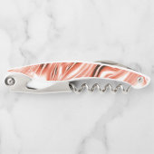 白いファンドに派手なサーモンから赤の長い波状のトレースへ ソムリエナイフ (正面)