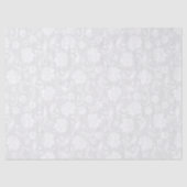 白いフローラが明るい灰色の背景に表示される 薄葉紙 (正面)