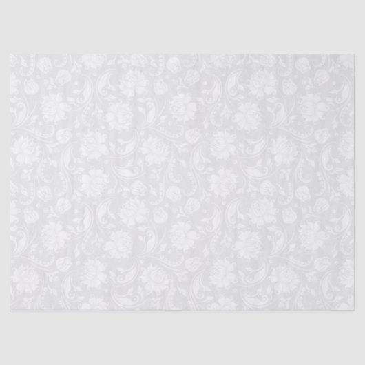 白いフローラが明るい灰色の背景に表示される 薄葉紙 (正面)